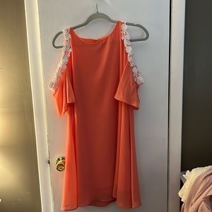 Coral Dress with cold shoulders with white trim, size medium.